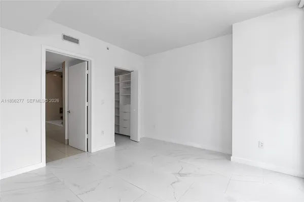 an empty room with closet
