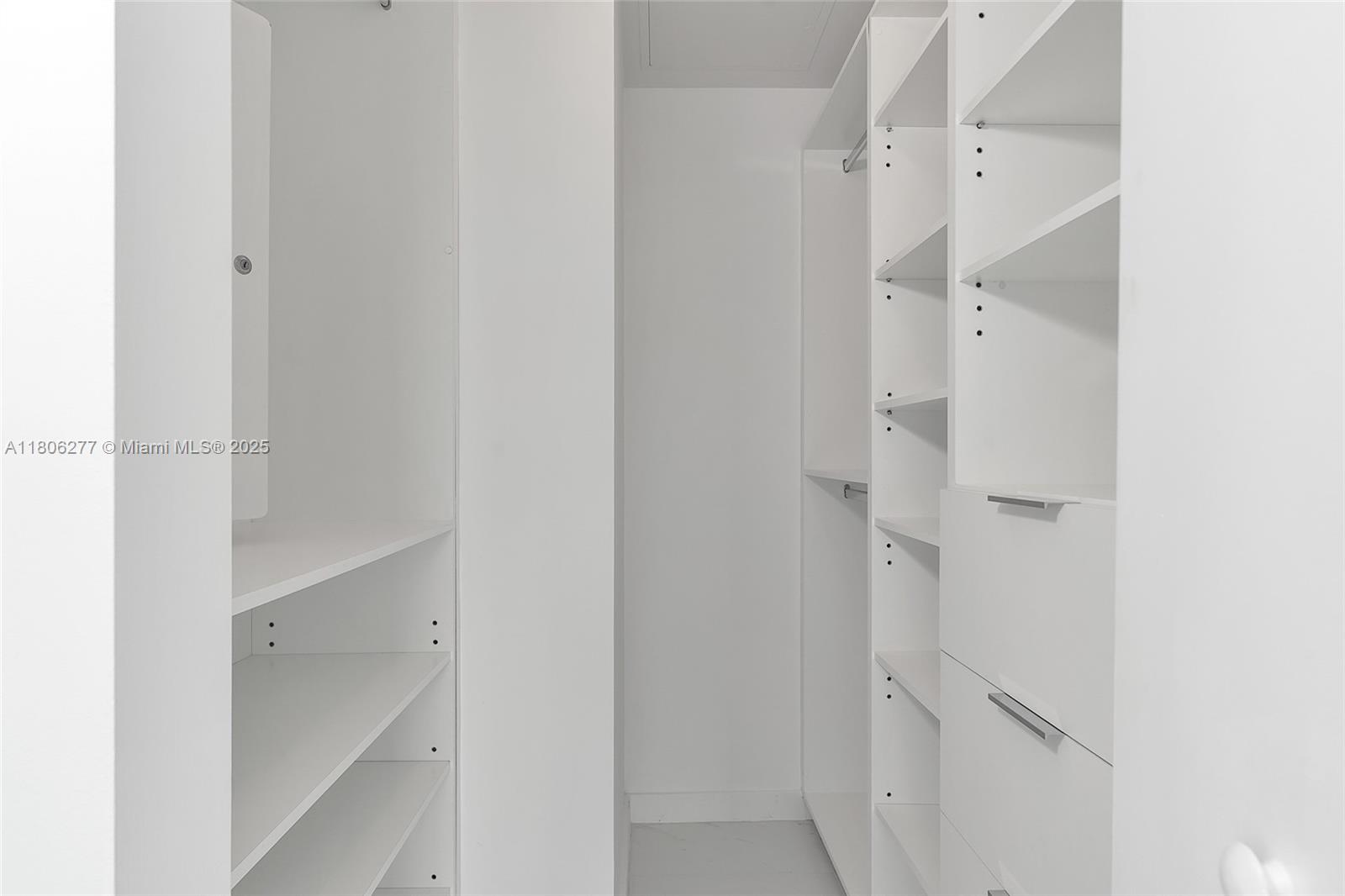 1300 South Miami Avenue, Unit 3211 Miami, FL 33130 - Photo 30 of 38 a bathroom with a double vanity sink and mirror