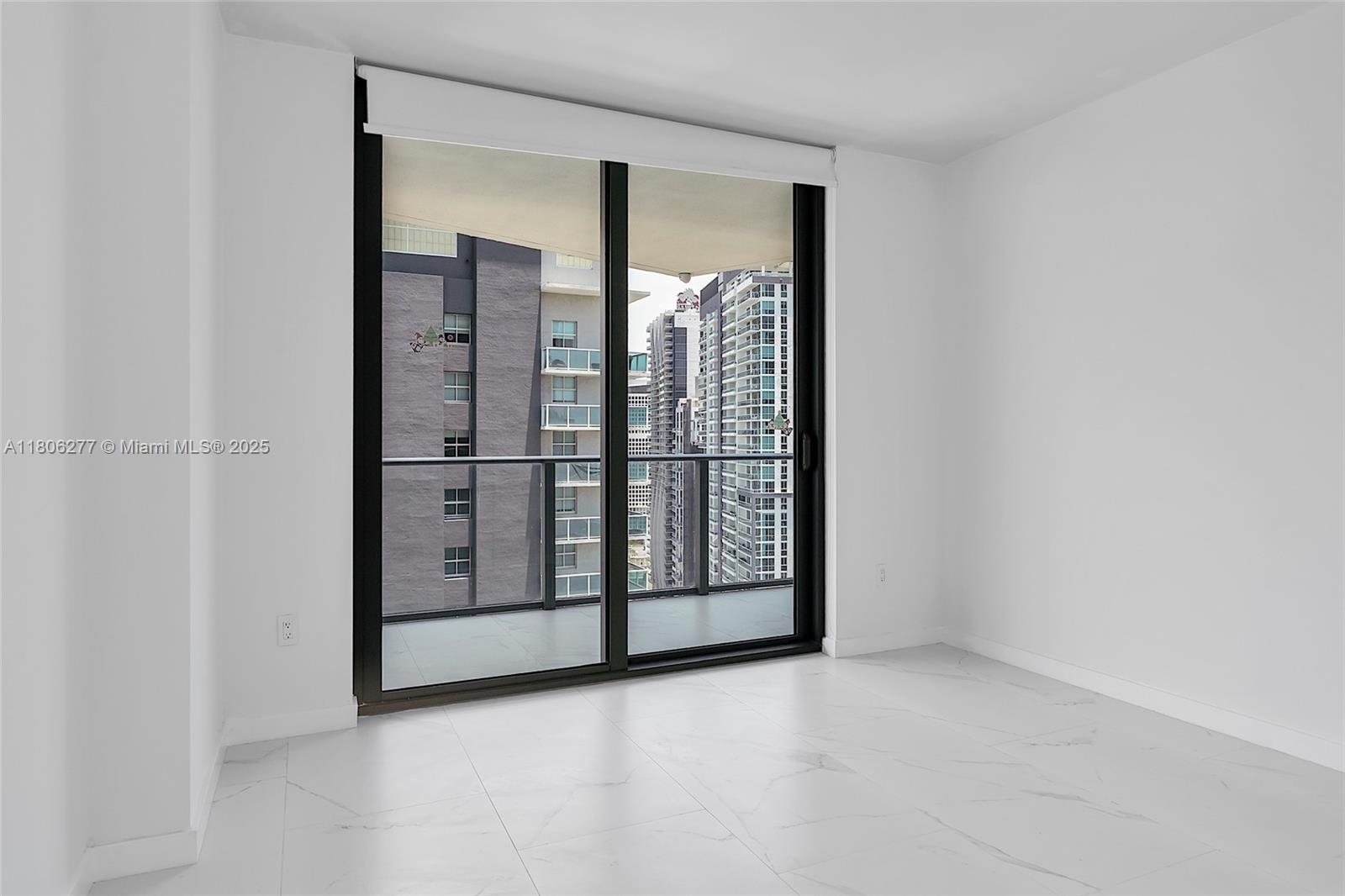 1300 South Miami Avenue, Unit 3211 Miami, FL 33130 - Photo 32 of 38 a view of a glass door with a glass door