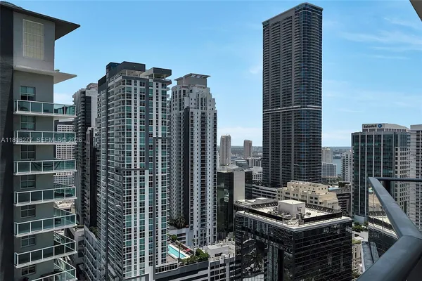 a view of a city with tall buildings