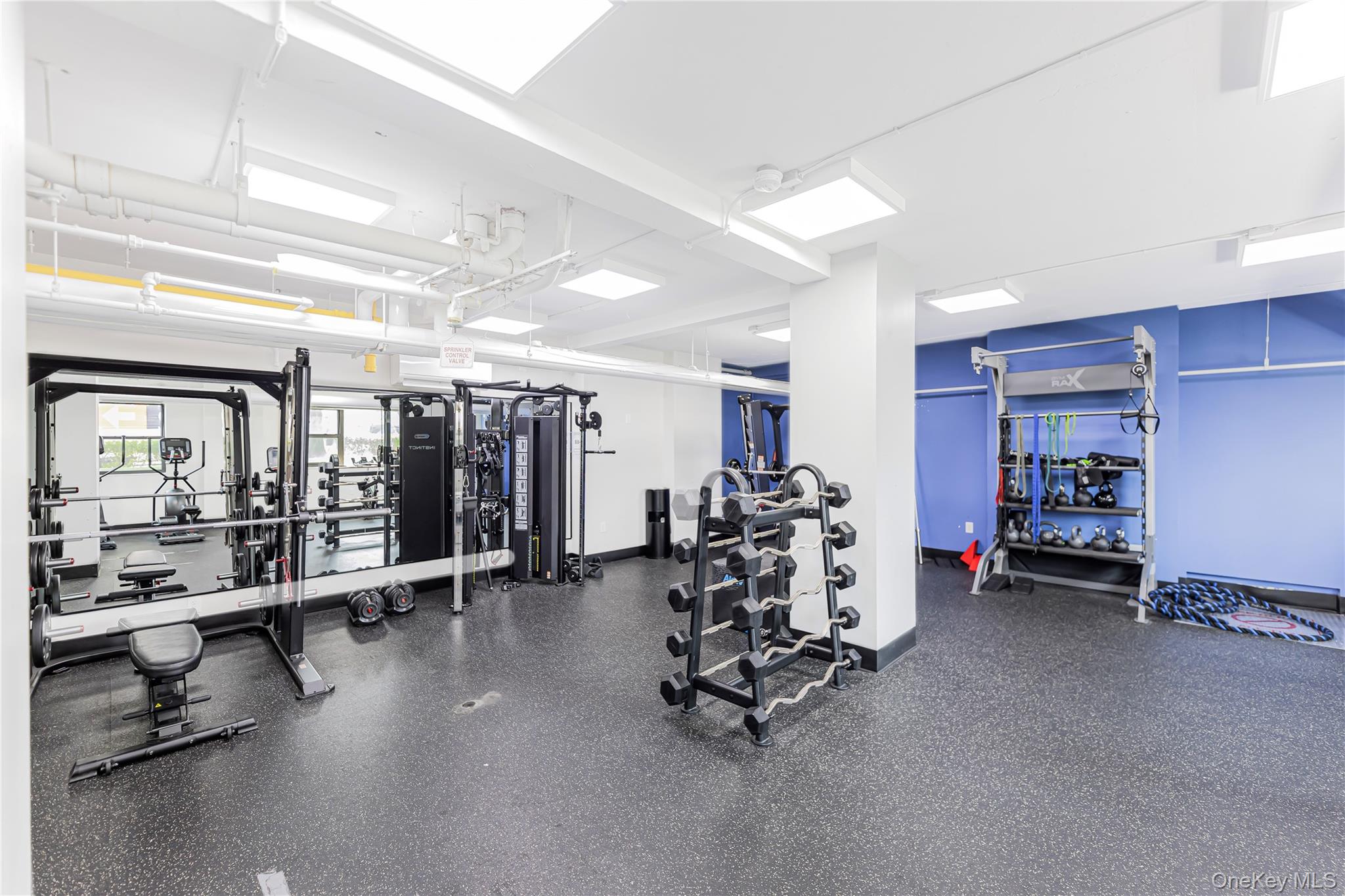 2 Fordham Hill Ovl, Unit 2F Bronx, NY 10468 - Photo 23 of 27 a view of a room with gym equipment