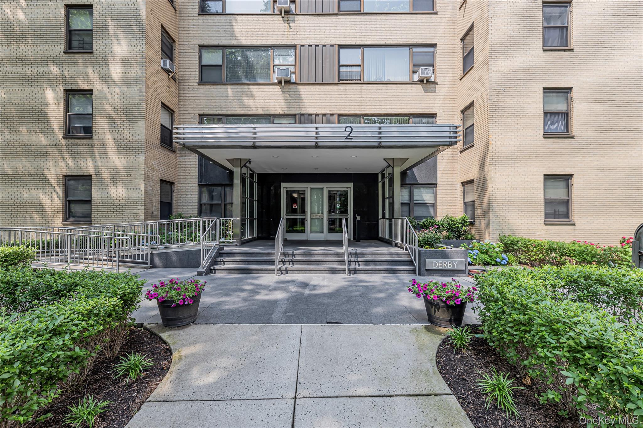 2 Fordham Hill Ovl, Unit 2F Bronx, NY 10468 - Photo 25 of 27 a view of a building with potted plants