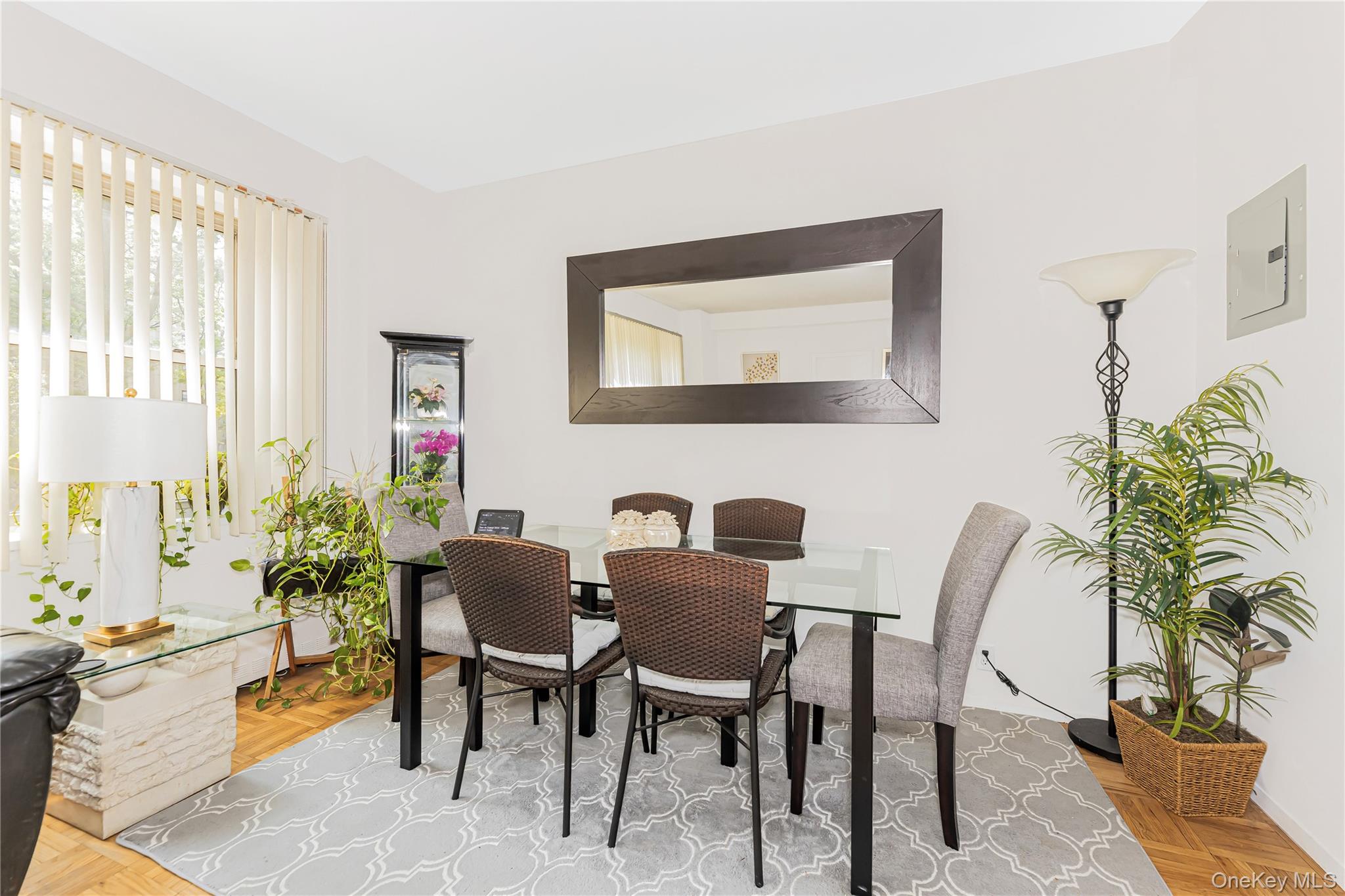 2 Fordham Hill Ovl, Unit 2F Bronx, NY 10468 - Photo 3 of 27 a view of a dining room with furniture and a potted plant