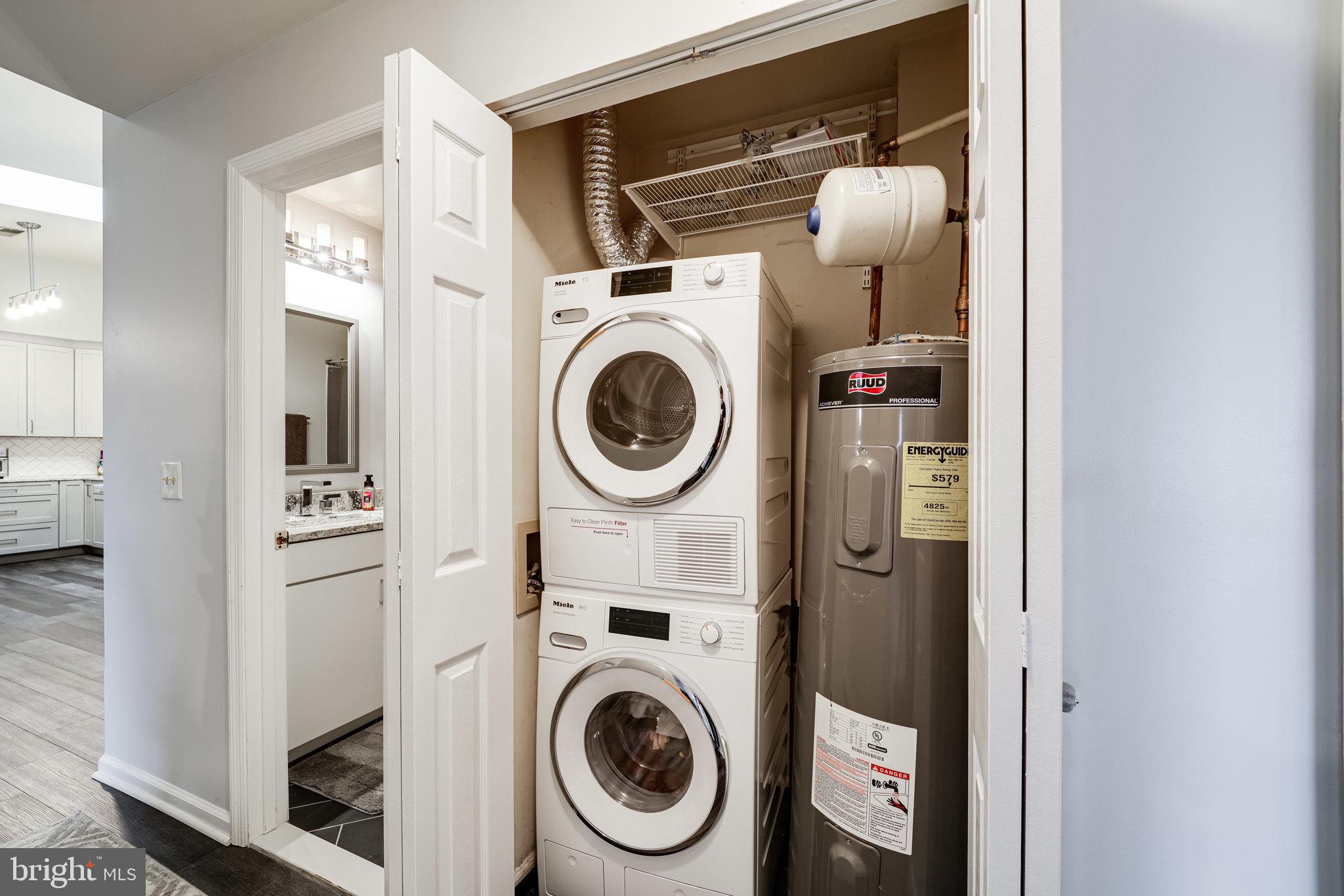7510 Ashby Lane, Unit J Alexandria, VA 22315 - Photo 32 of 53 a view of washer and dryer in a utility room
