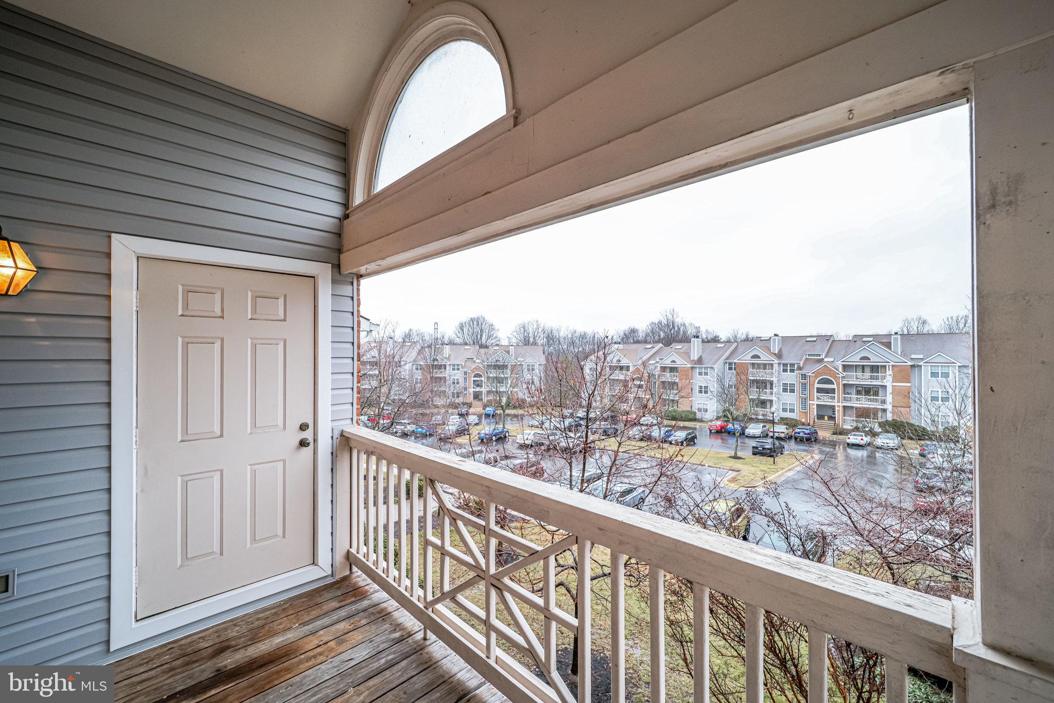7510 Ashby Lane, Unit J Alexandria, VA 22315 - Photo 33 of 53 a view of a balcony with city view