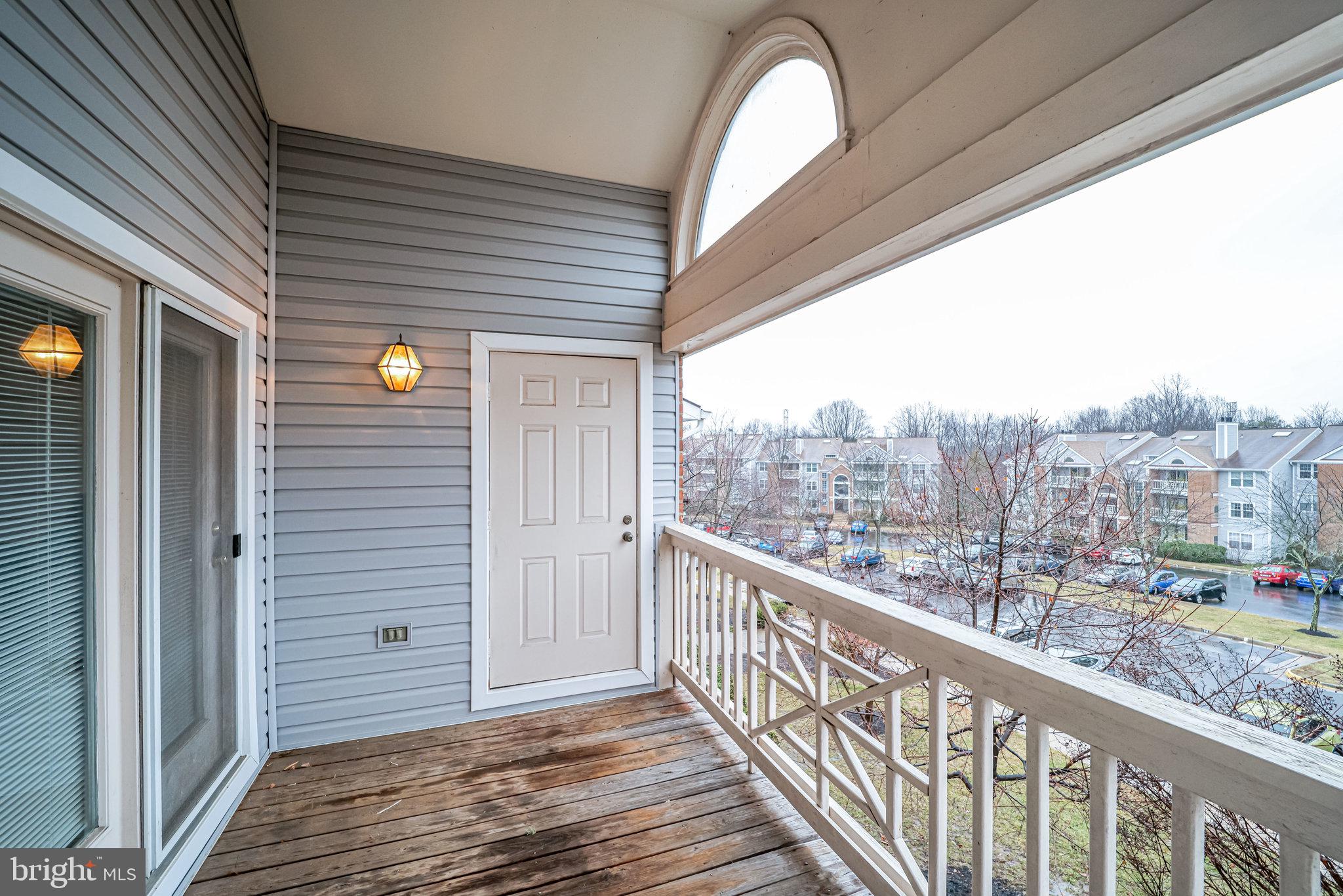 7510 Ashby Lane, Unit J Alexandria, VA 22315 - Photo 35 of 53 a view of a balcony with city view