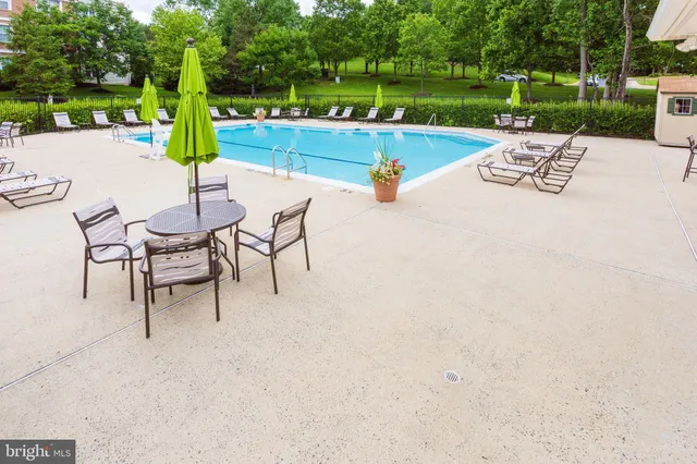 a view of a street with cars park