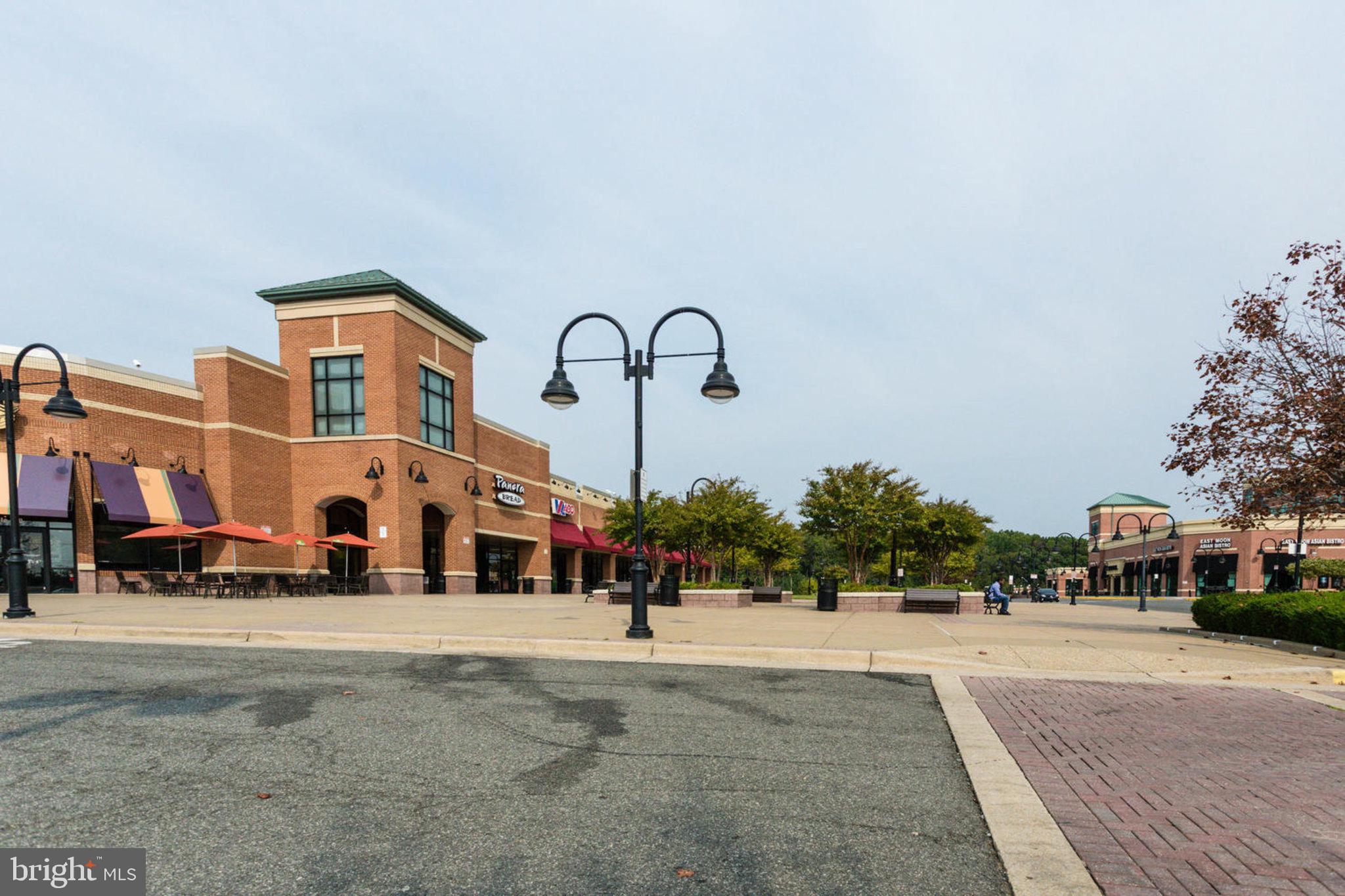 7510 Ashby Lane, Unit J Alexandria, VA 22315 - Photo 44 of 53 a group of cars parked in front of a building