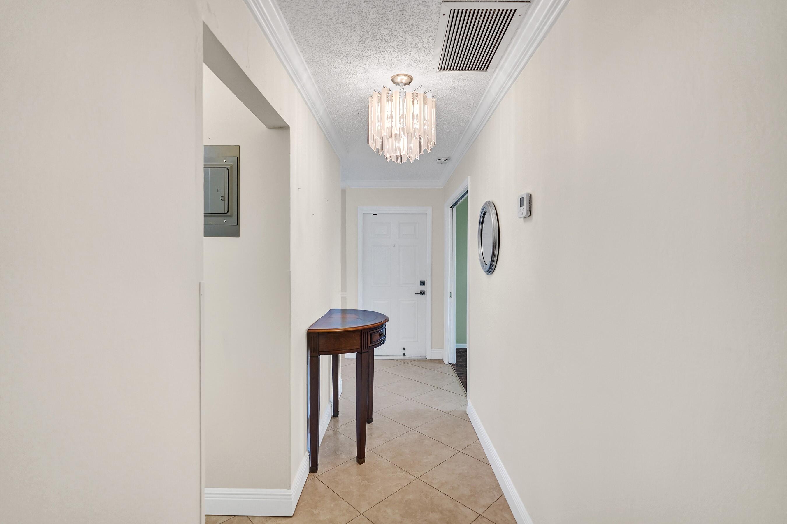 1051 Orange Terrace, Unit 101 Delray Beach, FL 33445 - Photo 27 of 54 entrance hallway