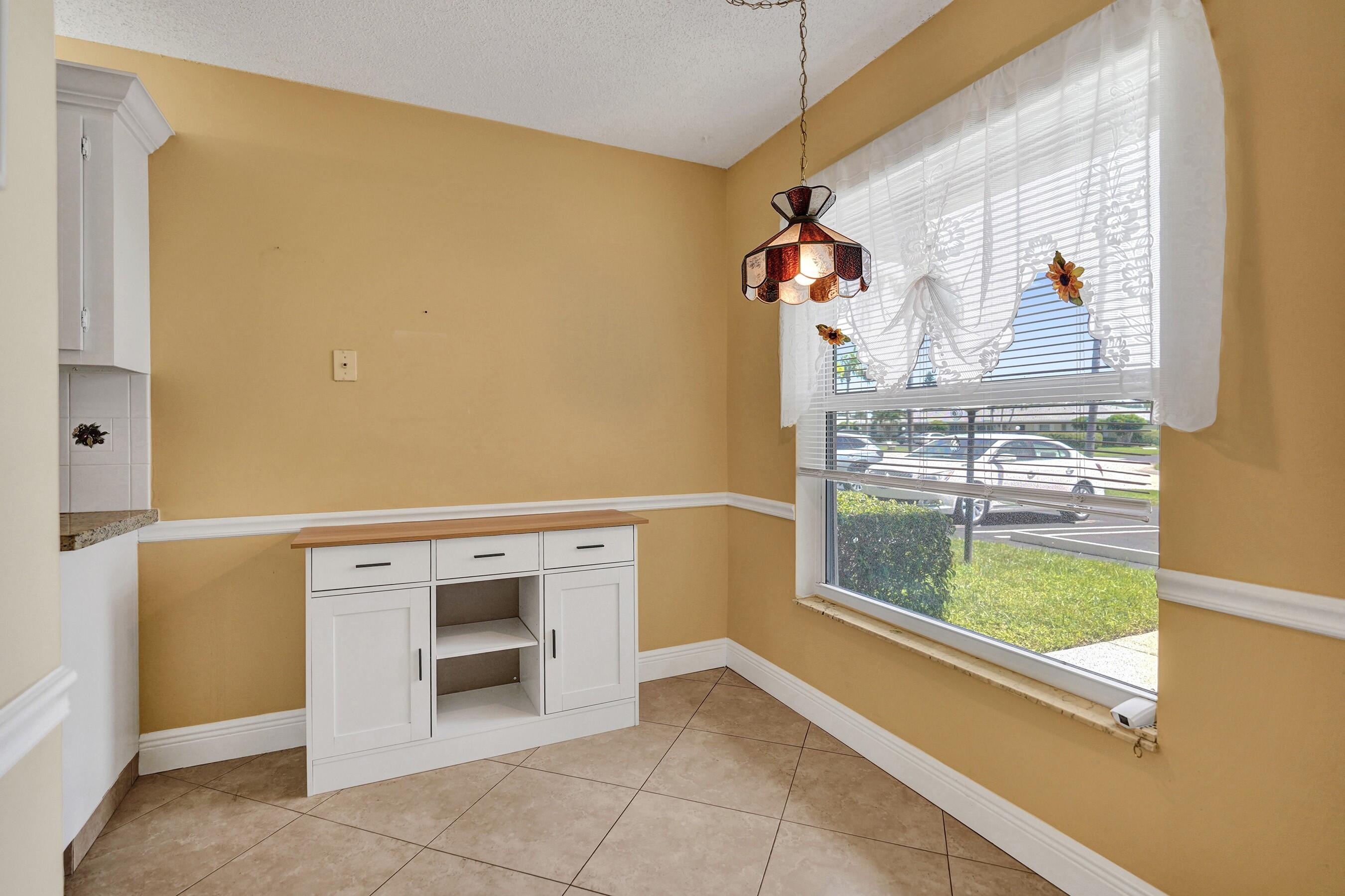 1051 Orange Terrace, Unit 101 Delray Beach, FL 33445 - Photo 44 of 54 a view of a storage & utility room