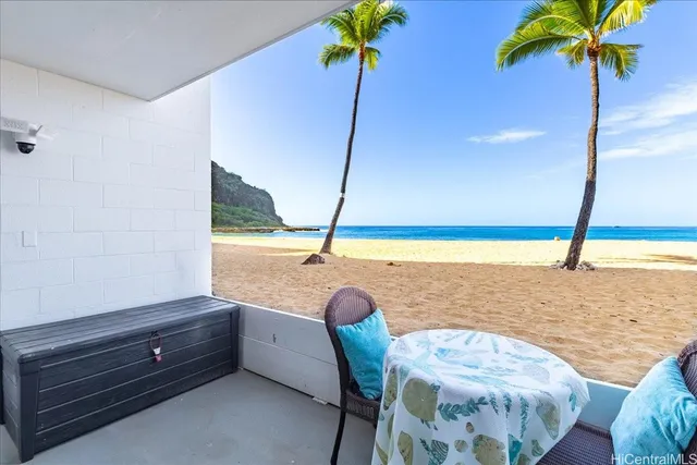 a view of a swimming pool and a patio