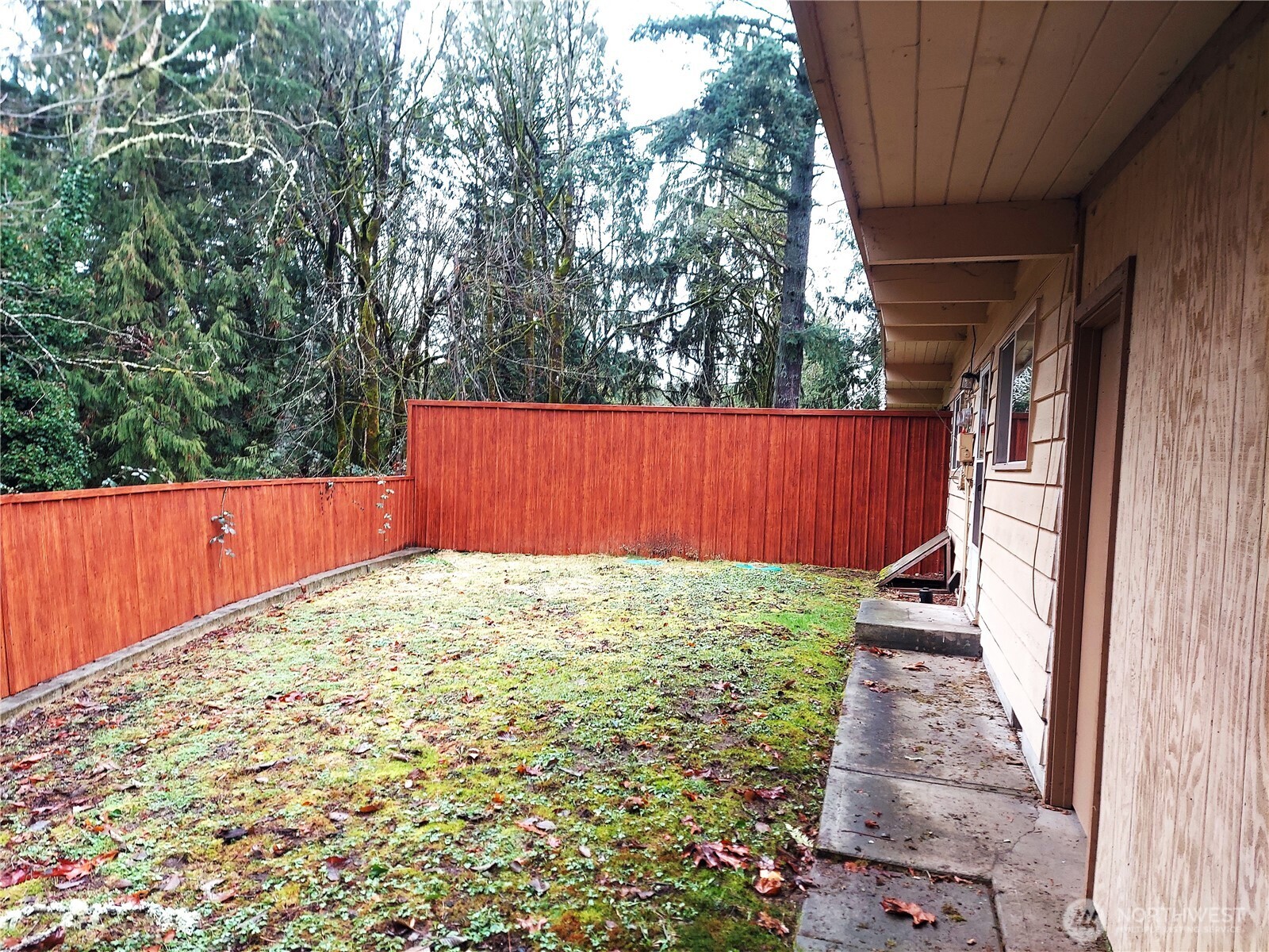 8417 Gold Way Everett, WA 98208 - Photo 18 of 18 a backyard of a house with lots of green space
