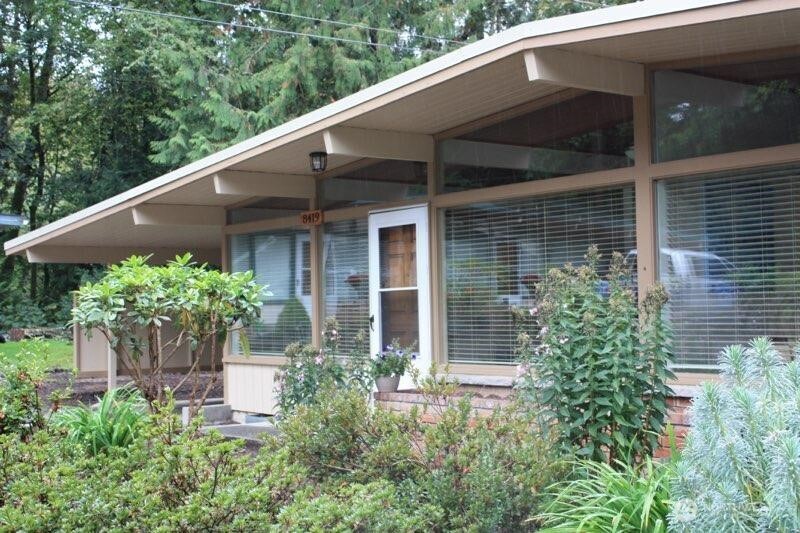 8417 Gold Way Everett, WA 98208 - Photo 2 of 18 a front view of a house with a yard