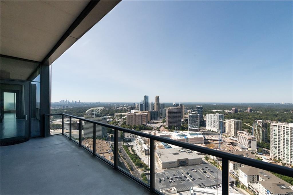 3630 Peachtree Road Northeast, Unit 3401 Atlanta, GA 30326 - Photo 33 of 72 a view of a city skyline from a balcony