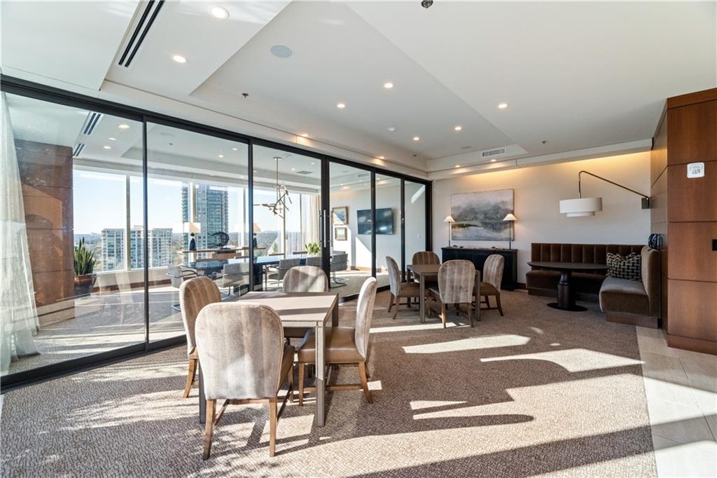 3630 Peachtree Road Northeast, Unit 3401 Atlanta, GA 30326 - Photo 63 of 72 a room with lots of tables and chairs
