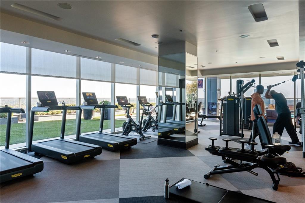 3630 Peachtree Road Northeast, Unit 3401 Atlanta, GA 30326 - Photo 66 of 72 a view of a room with gym equipment