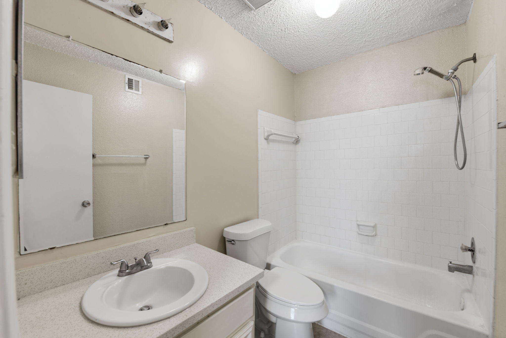 1310 Brenda Lane, Unit A Humble, TX 77338 - Photo 16 of 16 a bathroom with a sink toilet and shower
