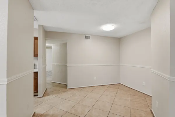 a view of a room with an empty space