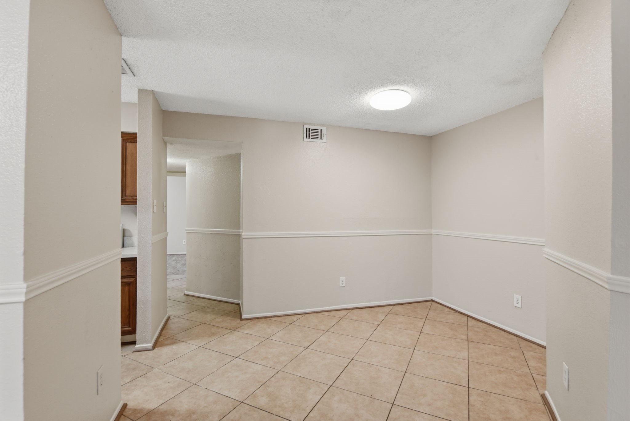 1310 Brenda Lane, Unit A Humble, TX 77338 - Photo 8 of 16 a view of a room with an empty space