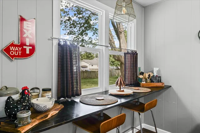 a table and chairs in a room