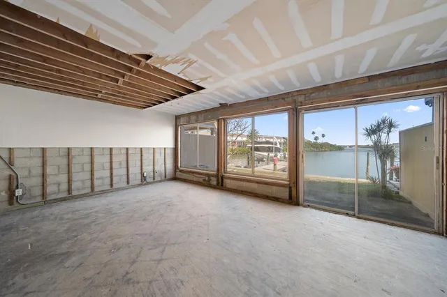 a view of an empty room with a balcony