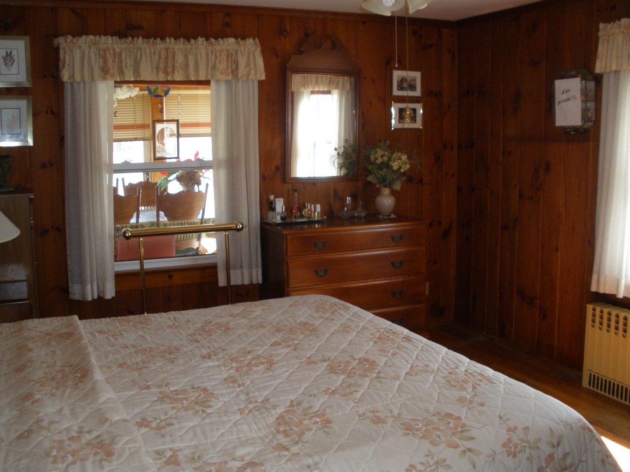 1603 North Main Road Otis, MA 01253 - Photo 16 of 17 a bedroom with a bed and a dresser