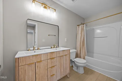 a picture of a bench in front of building