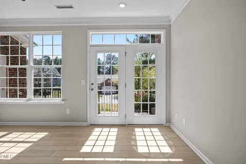 a view of a kitchen with a sink and a window