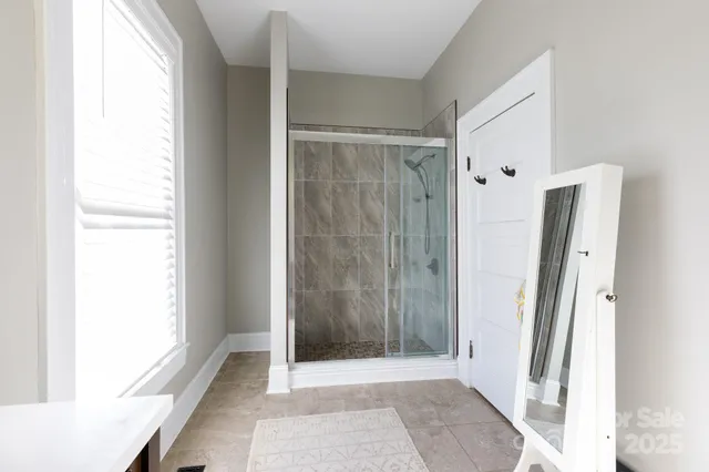 a view of a bathroom with a shower