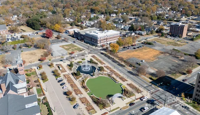 an aerial view of a houses with outdoor space