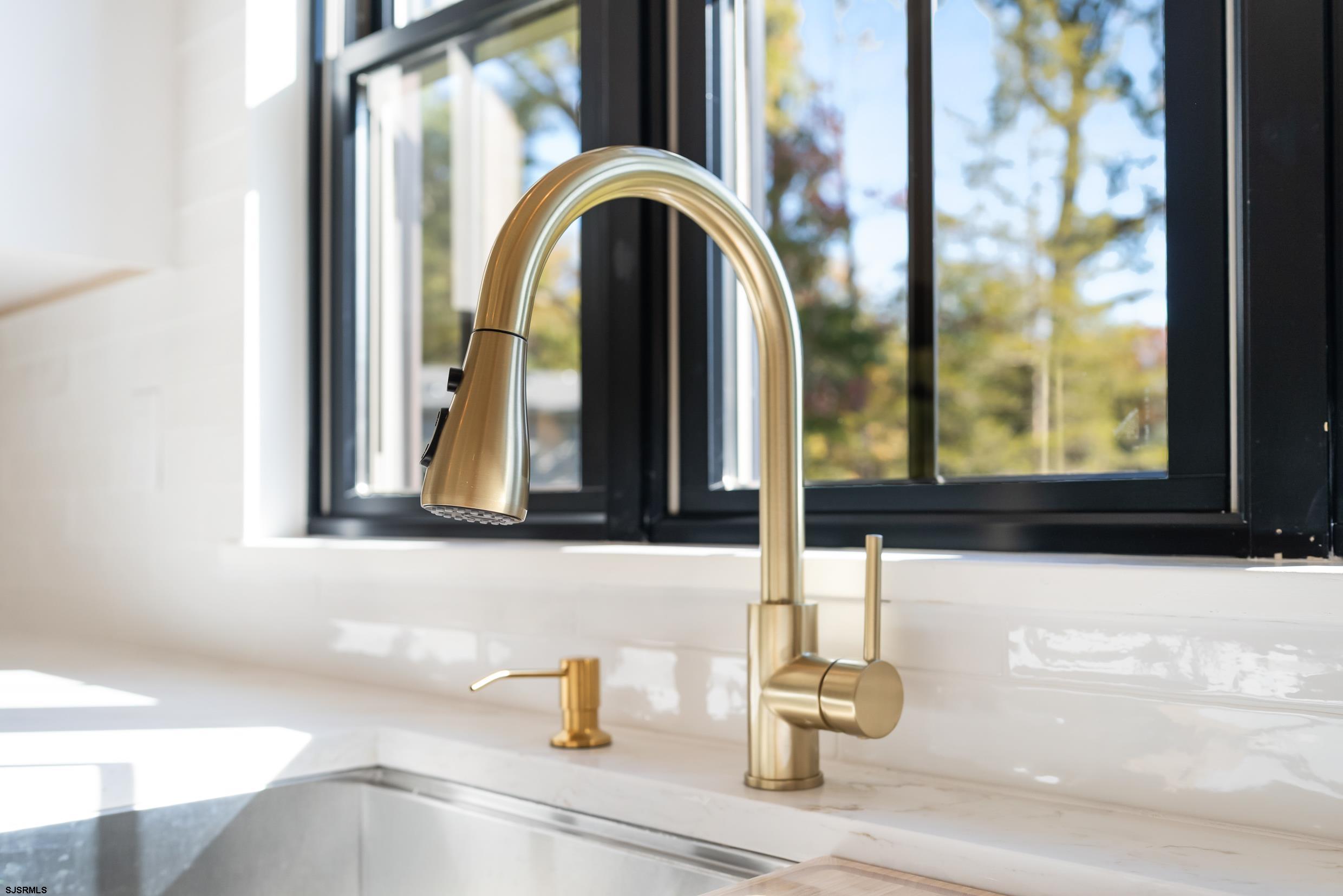 11 Evio John Court Marmora, NJ 08223 - Photo 20 of 49 a close view of sink and tap