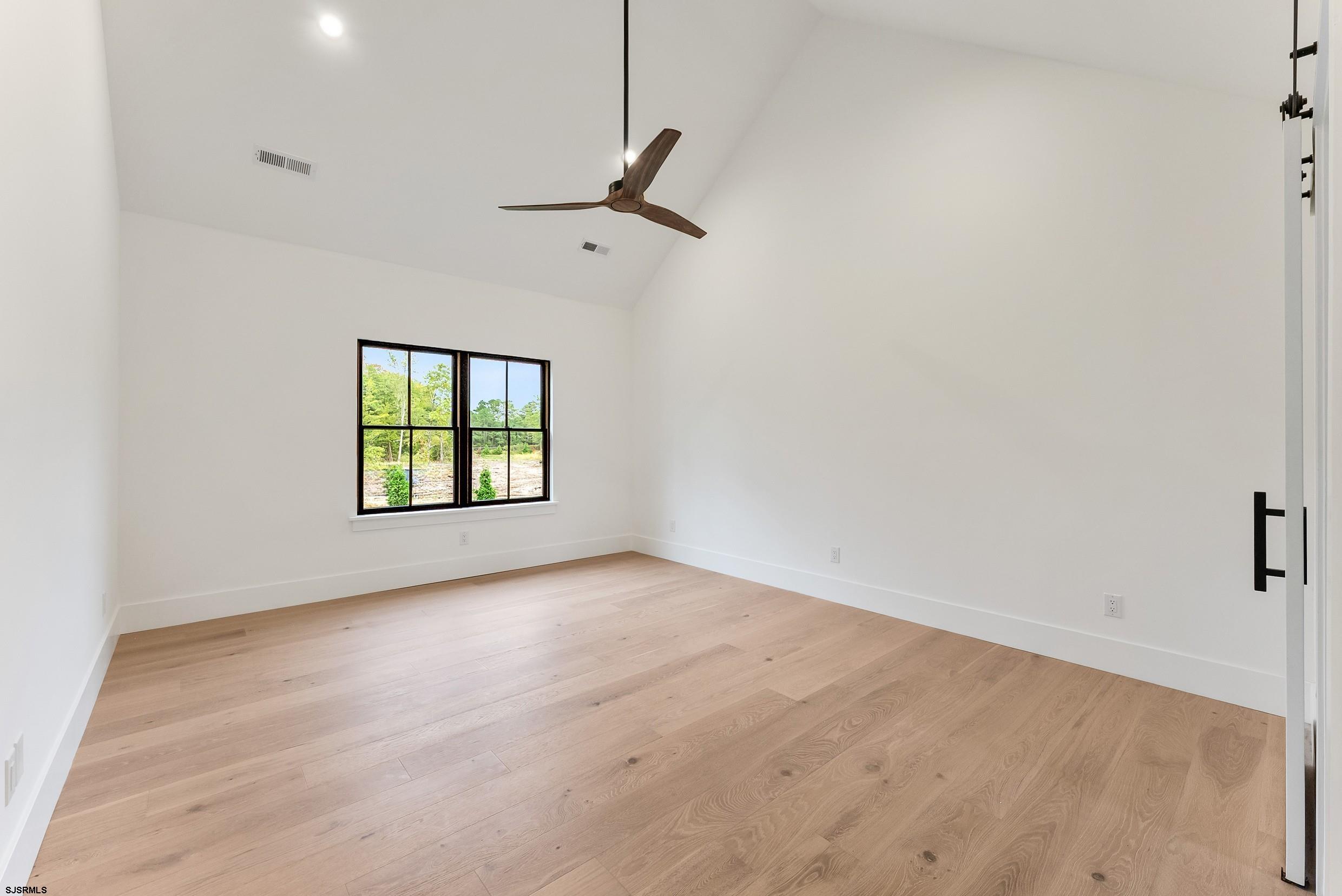 11 Evio John Court Marmora, NJ 08223 - Photo 26 of 49 an empty room with windows