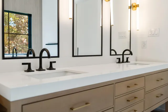 a bathroom with a toilet and a sink