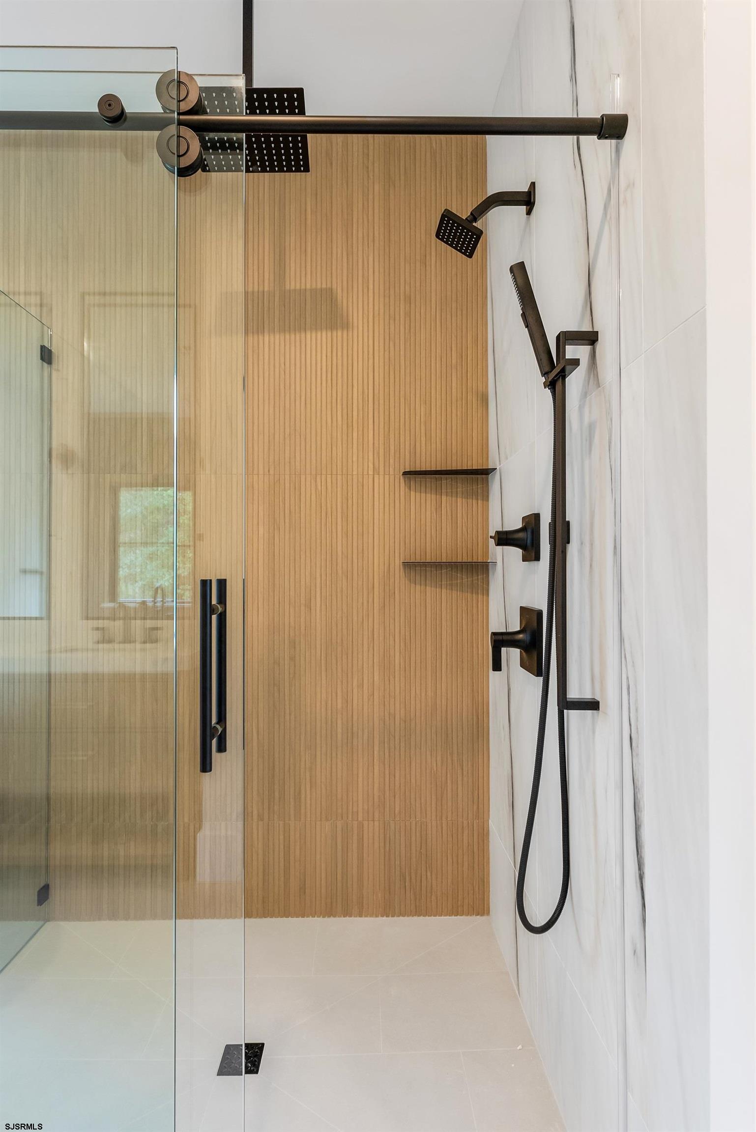 11 Evio John Court Marmora, NJ 08223 - Photo 34 of 49 a bathroom that has a shower