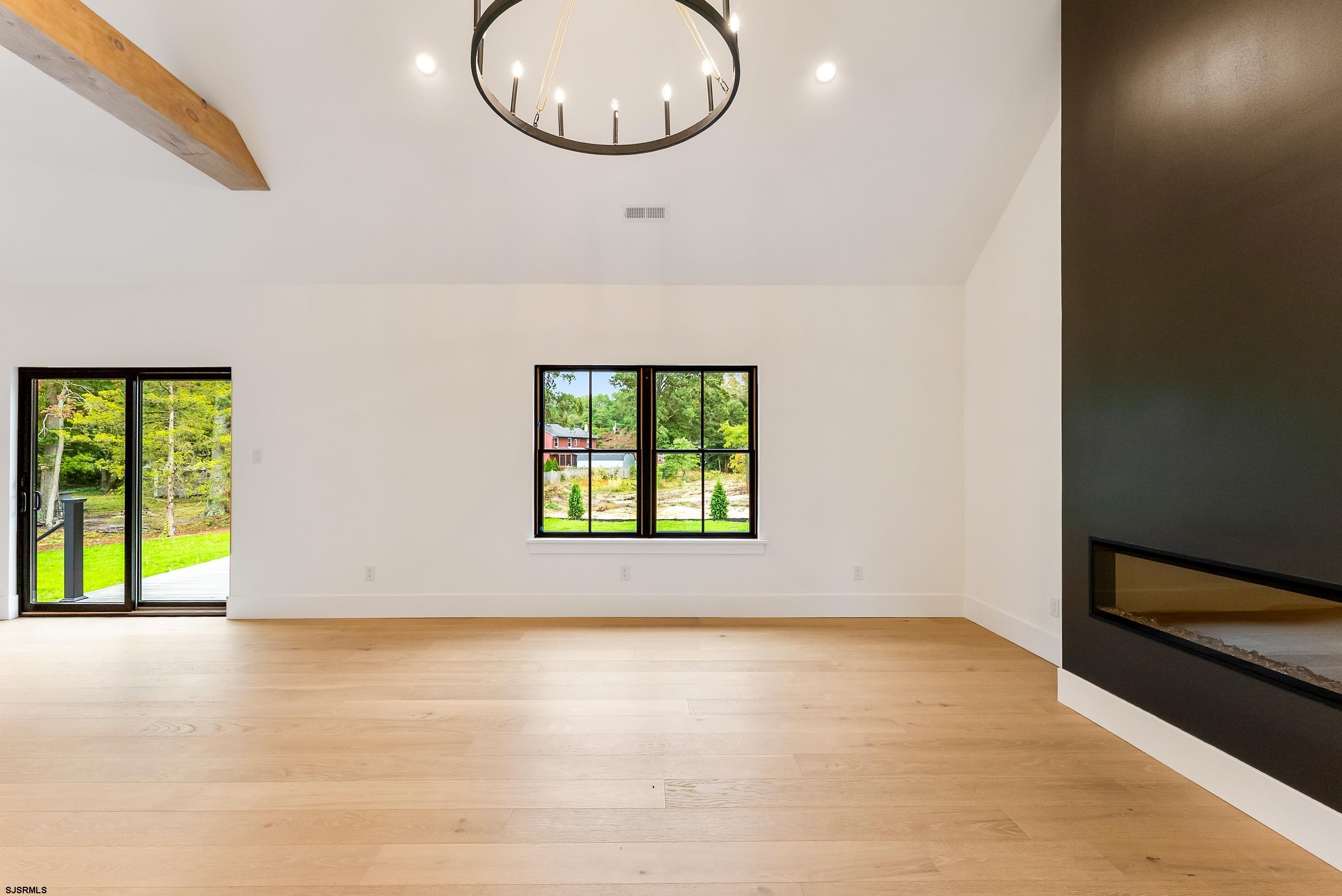 11 Evio John Court Marmora, NJ 08223 - Photo 10 of 49 an empty room with a window