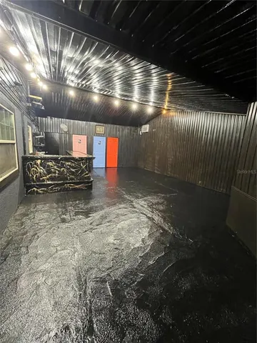 a view of a backyard of the house