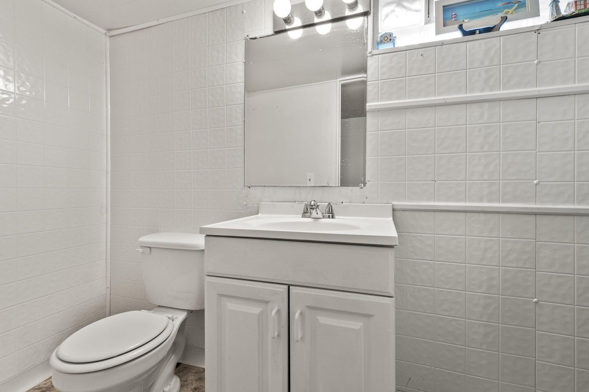 695 Raleigh Drive Columbus, OH 43228 - Photo 34 of 57 full bathroom in the basement