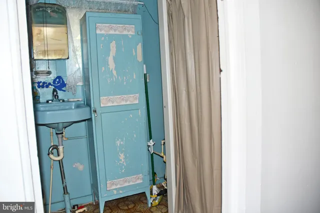 a bathroom with a mirror