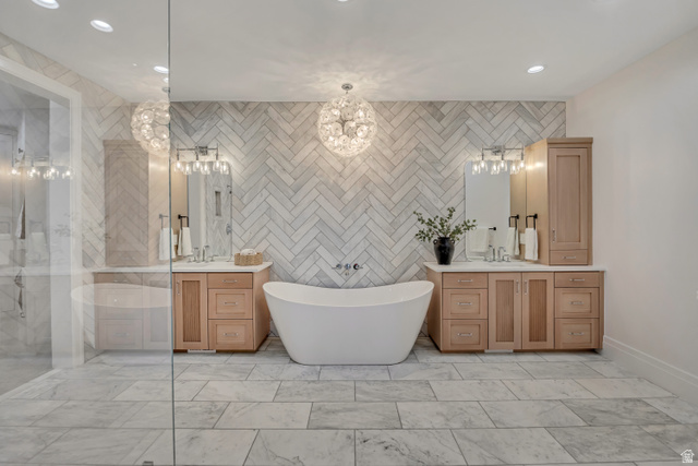 1720 Hillcrest Circle Mapleton, UT 84664 - Photo 55 of 116 Full bath with tile walls, two vanities, light marble finish flooring, a soaking tub, and a stall shower