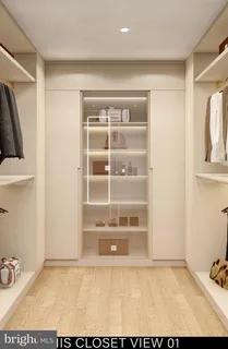a view of a hallway with wooden shelves