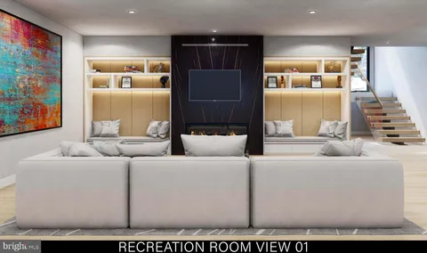 a living room with furniture flat screen tv and a fireplace