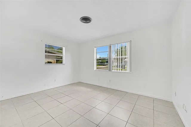 an empty room with windows