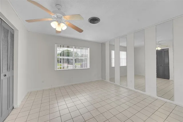 a view of an empty room with window