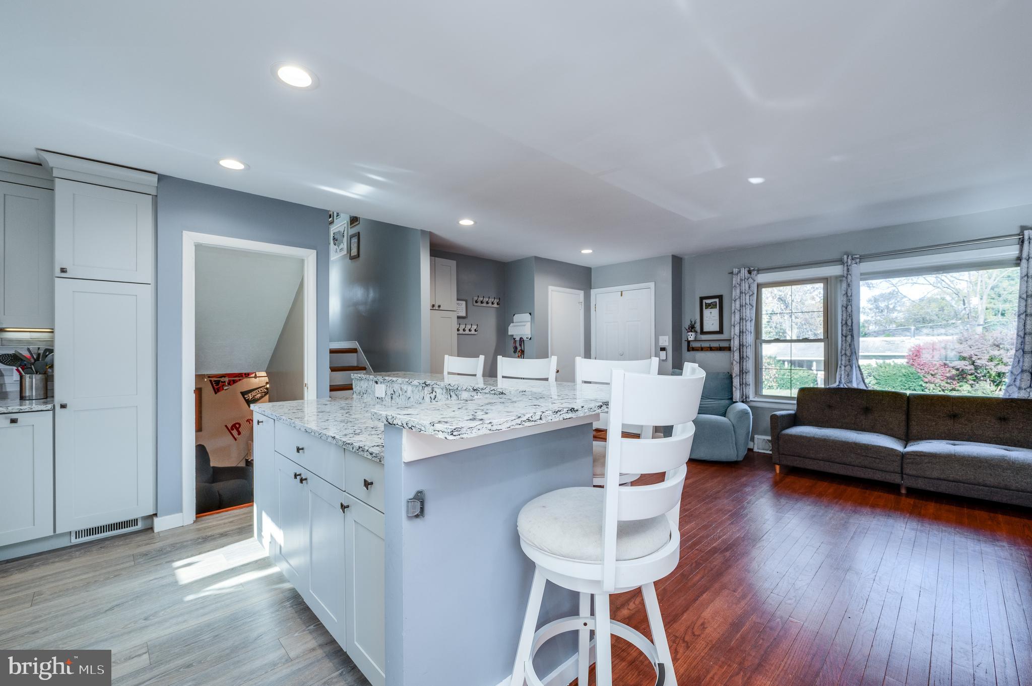 118 Octagon Avenue Sinking Spring, PA 19608 - Photo 13 of 45 a living room with a couch and a wooden floor