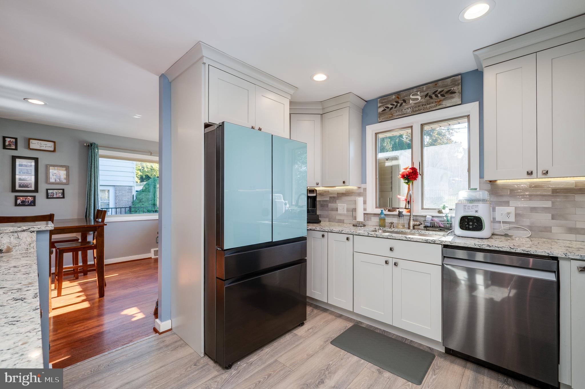 118 Octagon Avenue Sinking Spring, PA 19608 - Photo 15 of 45 a kitchen with stainless steel appliances granite countertop a refrigerator and a stove top oven
