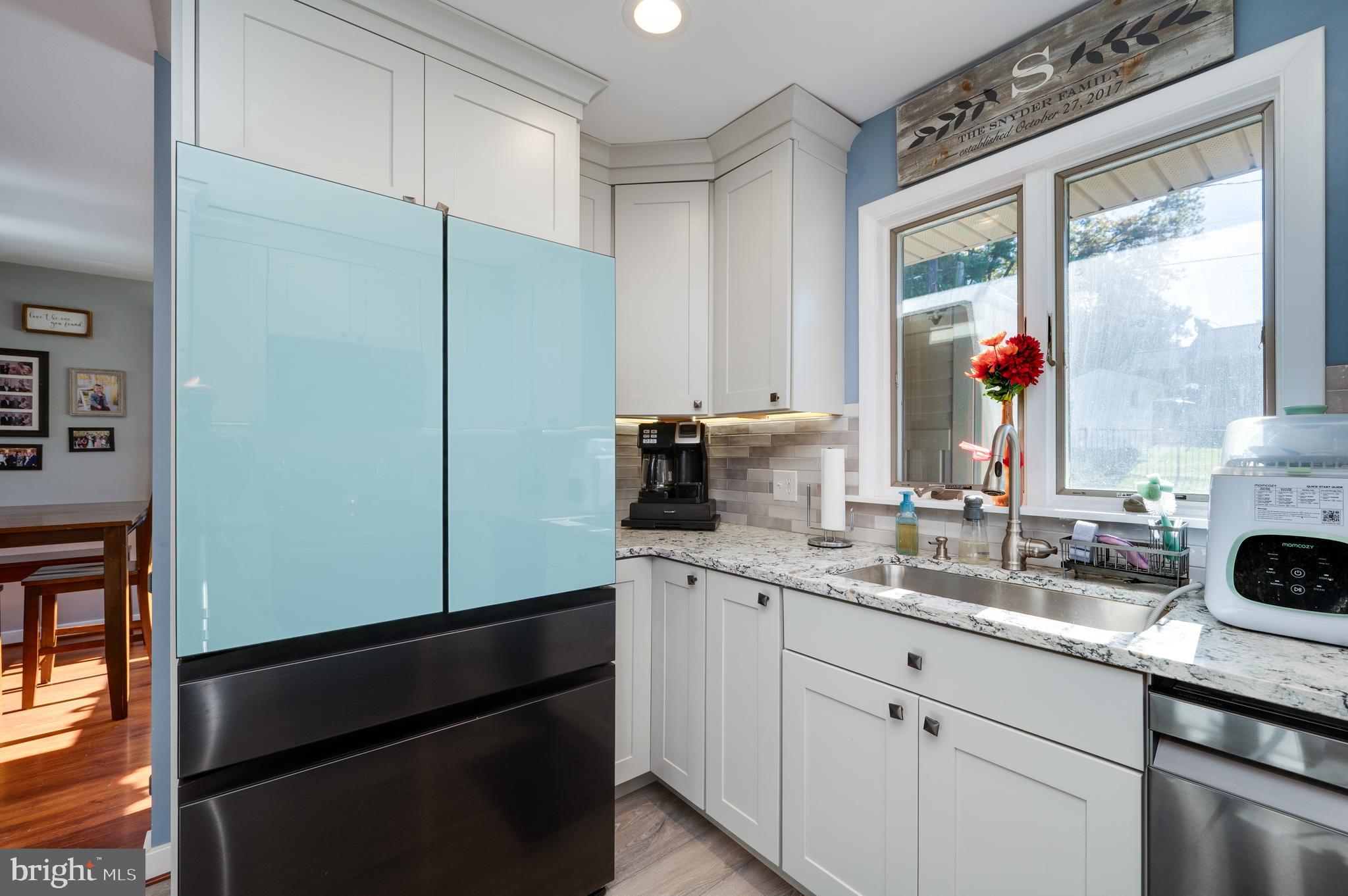 118 Octagon Avenue Sinking Spring, PA 19608 - Photo 19 of 45 a kitchen with a sink and a refrigerator