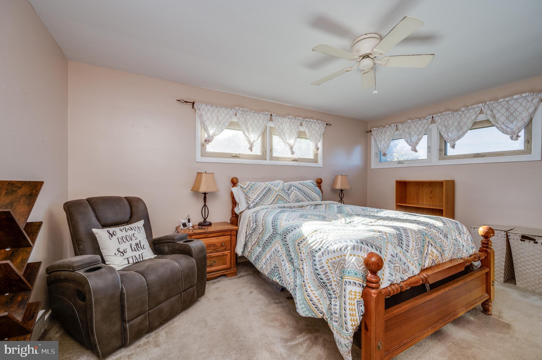 118 Octagon Avenue Sinking Spring, PA 19608 - Photo 22 of 45 a bed room with a bed and a couch