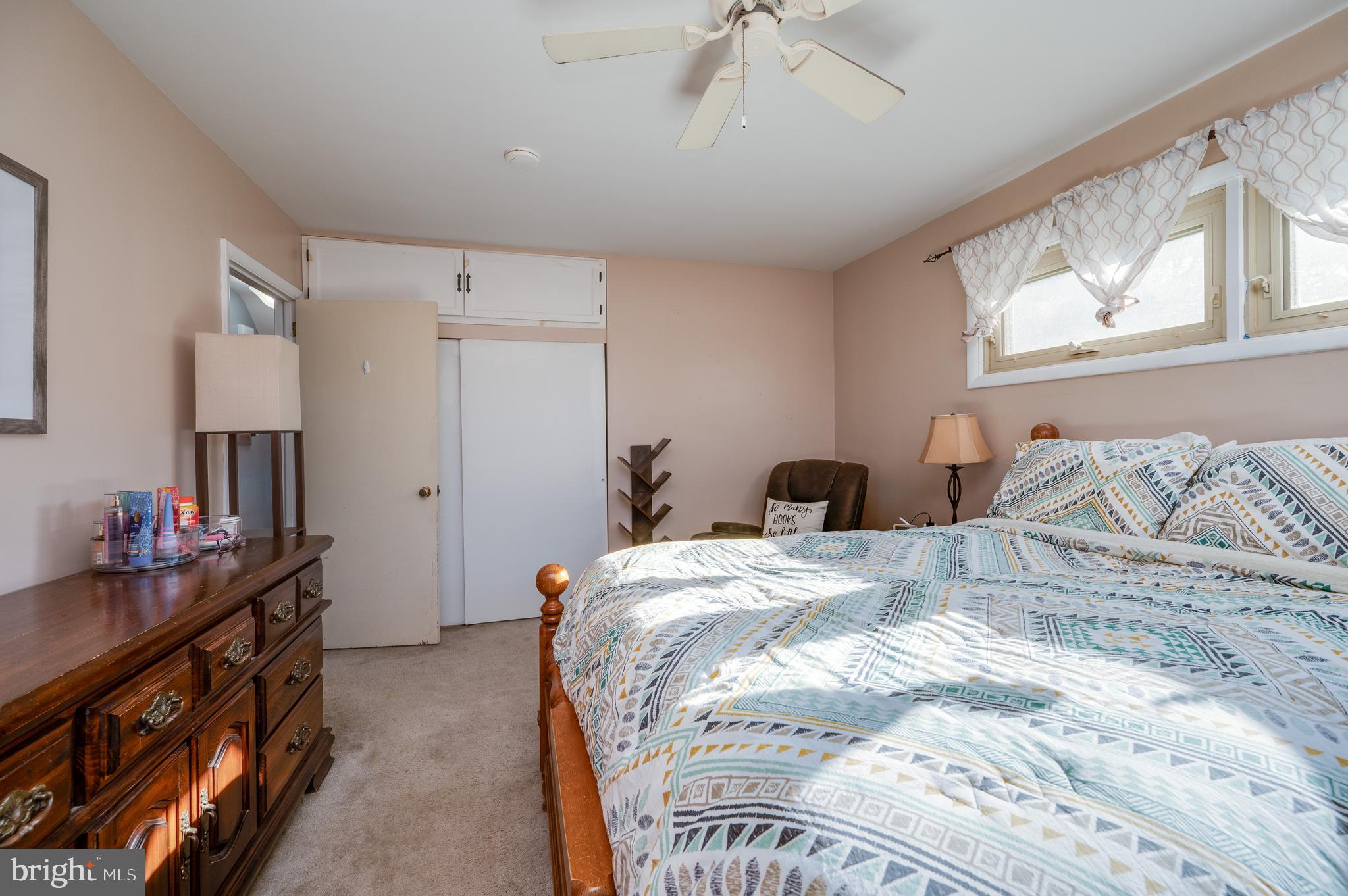 118 Octagon Avenue Sinking Spring, PA 19608 - Photo 25 of 45 a bedroom with a bed and a dresser