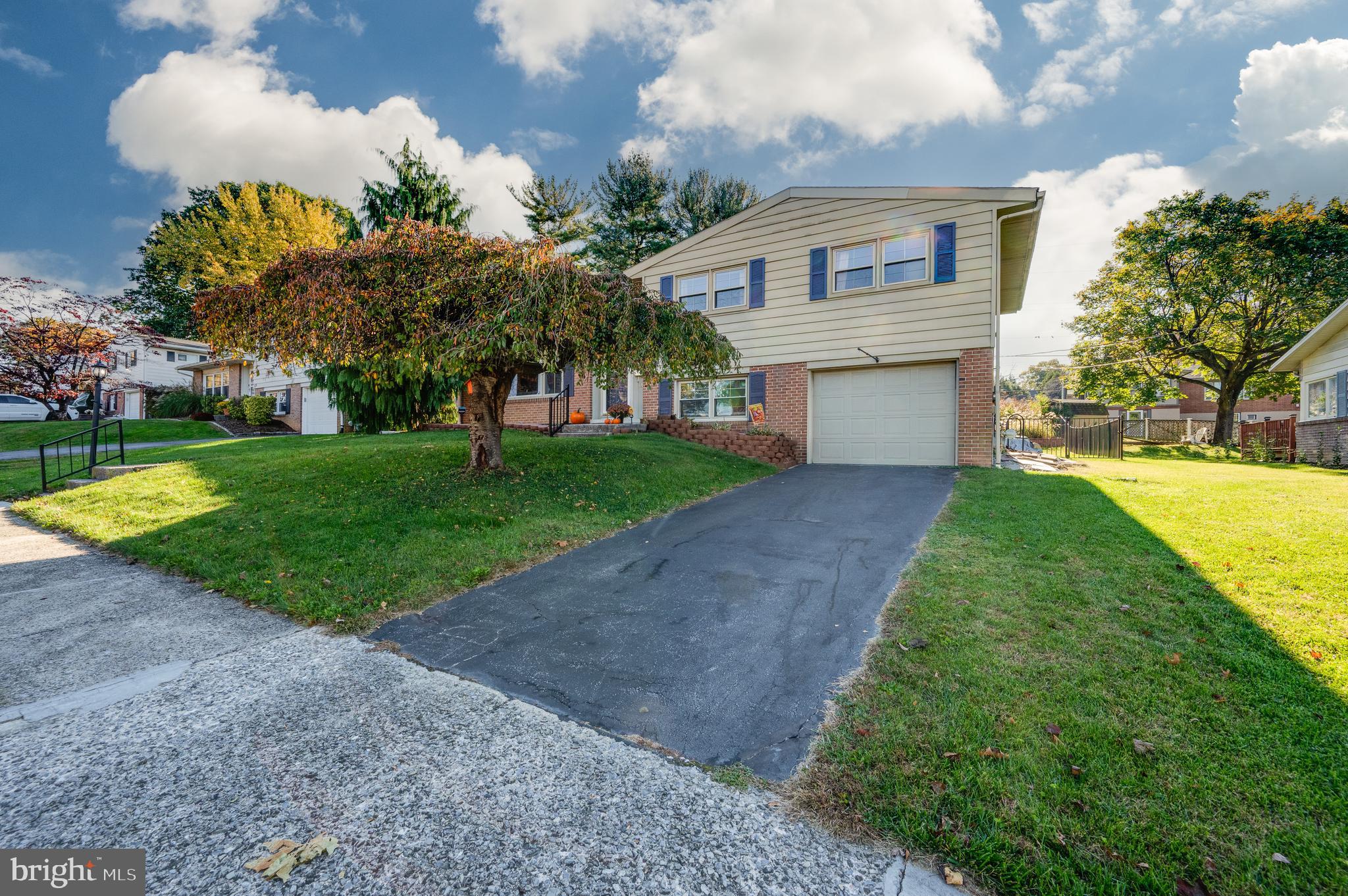 118 Octagon Avenue Sinking Spring, PA 19608 - Photo 45 of 45 a front view of a house with a yard and garage