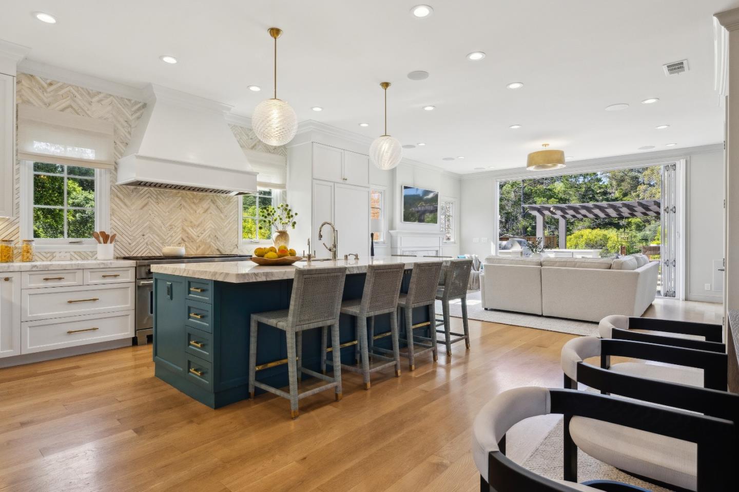 748 Jacaranda Circle Hillsborough, CA 94010 - Photo 16 of 41 a large kitchen with a table and chairs